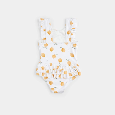 Smaller lemon-print swimsuit front view in toddler size with ruffle waist detail.