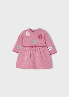 Front view of pink Mayoral baby knit dress with white, grey and berry flower motifs