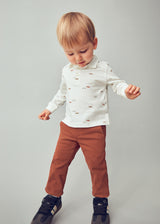Toddler wearing slim-fit chinos showing adjustable waist and neat silhouette.