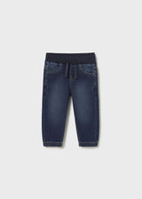 Front flat lay of Mayoral baby denim jogger pants in Dark Denim/Navy with cuffed hems.