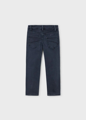 Back view of boys navy pants with patch pockets