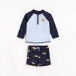 Petit Lem navy raglan rash guard and submarine print swim shorts set flat lay for baby boy