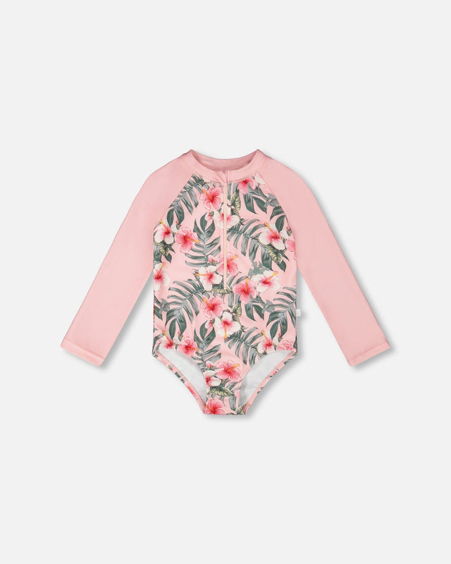 Front flat lay of Deux par Deux girl long sleeve one-piece rashguard in pink hibiscus print