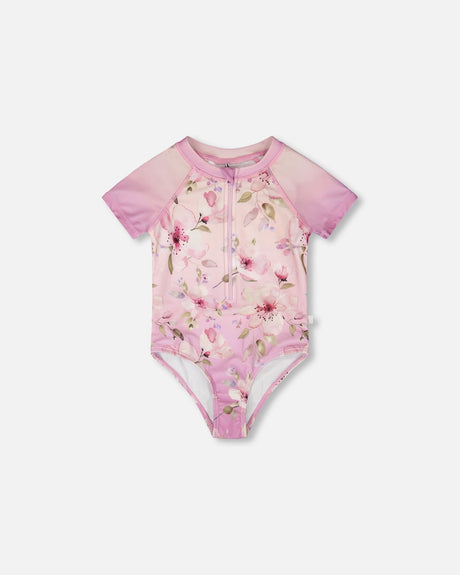 Front flat lay of Deux par Deux girl one-piece swimsuit in purple flower print