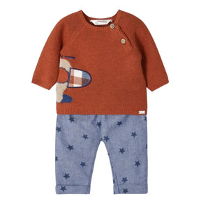 Front view of rust Mayoral baby plane sweater with blue star-print pants