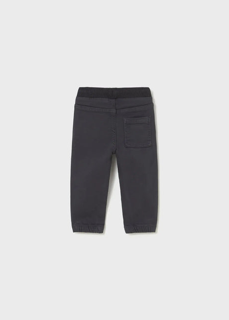 Side view of baby twill joggers showing tapered leg and ankle cuffs