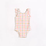 Pastel gingham one-piece swimsuit for baby and toddler girls laid flat on white background.