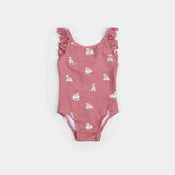 Front flat lay of Petit Lem baby girl jazzberry one-piece swimsuit with swan balloon print and frilly straps
