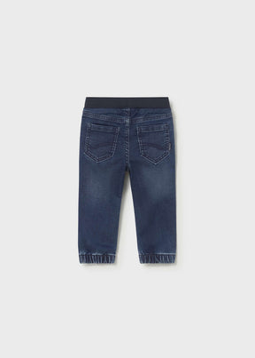 Back view of dark blue baby jogger jeans with patch pockets