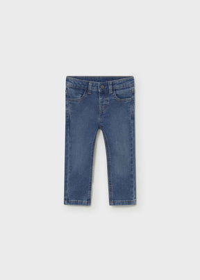 Front view of baby boys light blue slim-fit jeans