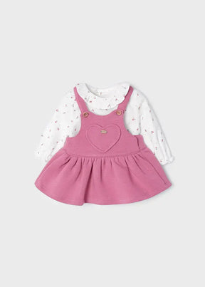Front view of pink baby girls pinafore dress and white floral blouse set