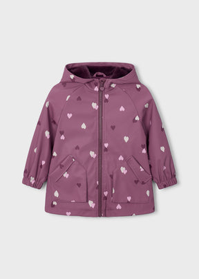 Front view of mauve girls hooded raincoat with heart print