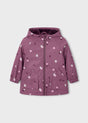 Front view of mauve girls hooded raincoat with heart print