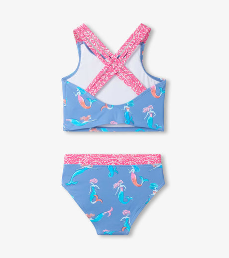 Back view of girls mermaid tankini swimsuit showing triple crisscross straps and coordinated patterned trim.