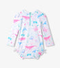 Back view of baby girl one-piece swim suit showing zipper closure and pastel sealife print.