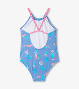 Back view of girls mermaid swimsuit showing scoop back and patterned crisscross-style shoulder straps.